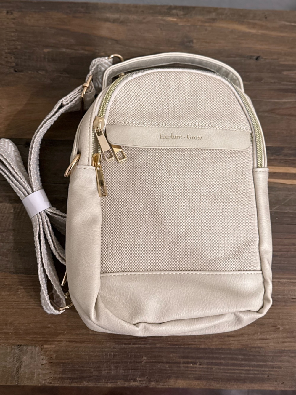 Explore & Cross Cream Mini Backpack Crossbody